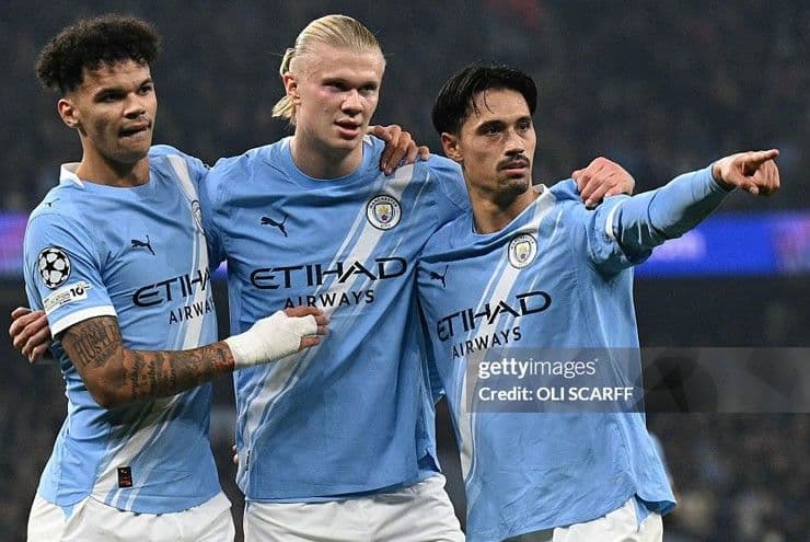 Ba cầu thủ Man City, trong đó có Erling Haaland, ăn mừng chiến thắng Champions League.