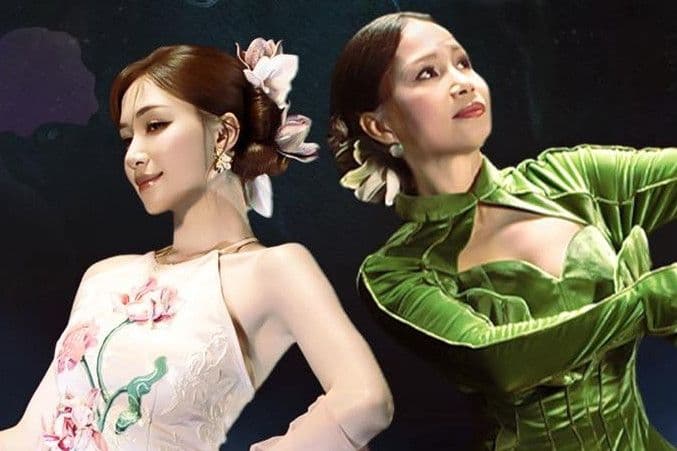 Cẩm Ly và Hòa Minzy trong trang phục truyền thống, hình ảnh trung tâm của cuộc tranh cãi về ca từ.