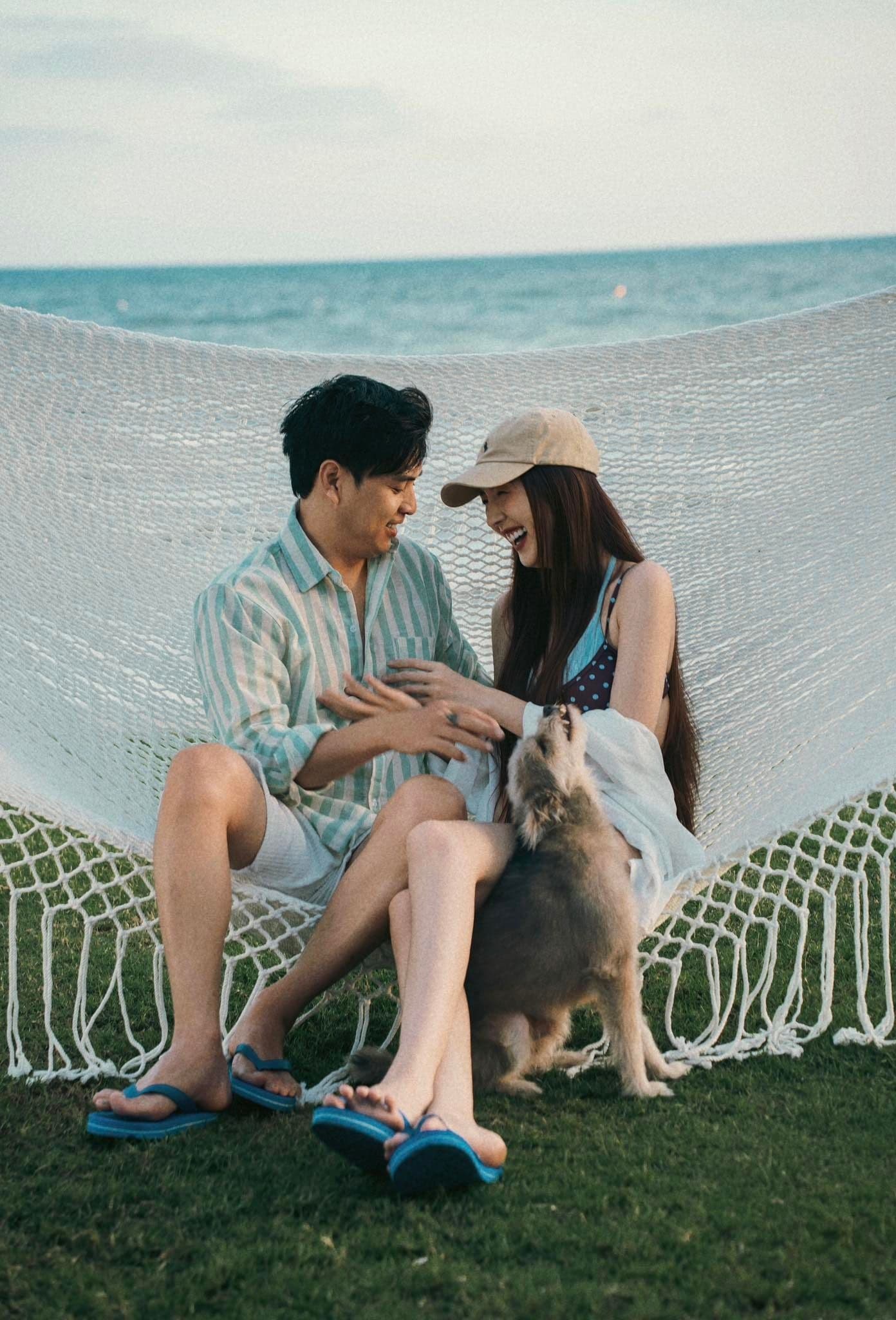 Hồ Quang Hiếu và Tuệ Như thư giãn trên võng, biểu tượng hạnh phúc gia đình.