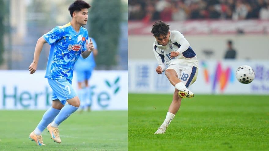 Hai cầu thủ U23 Việt Nam và U23 Thái Lan thể hiện kỹ năng trên sân