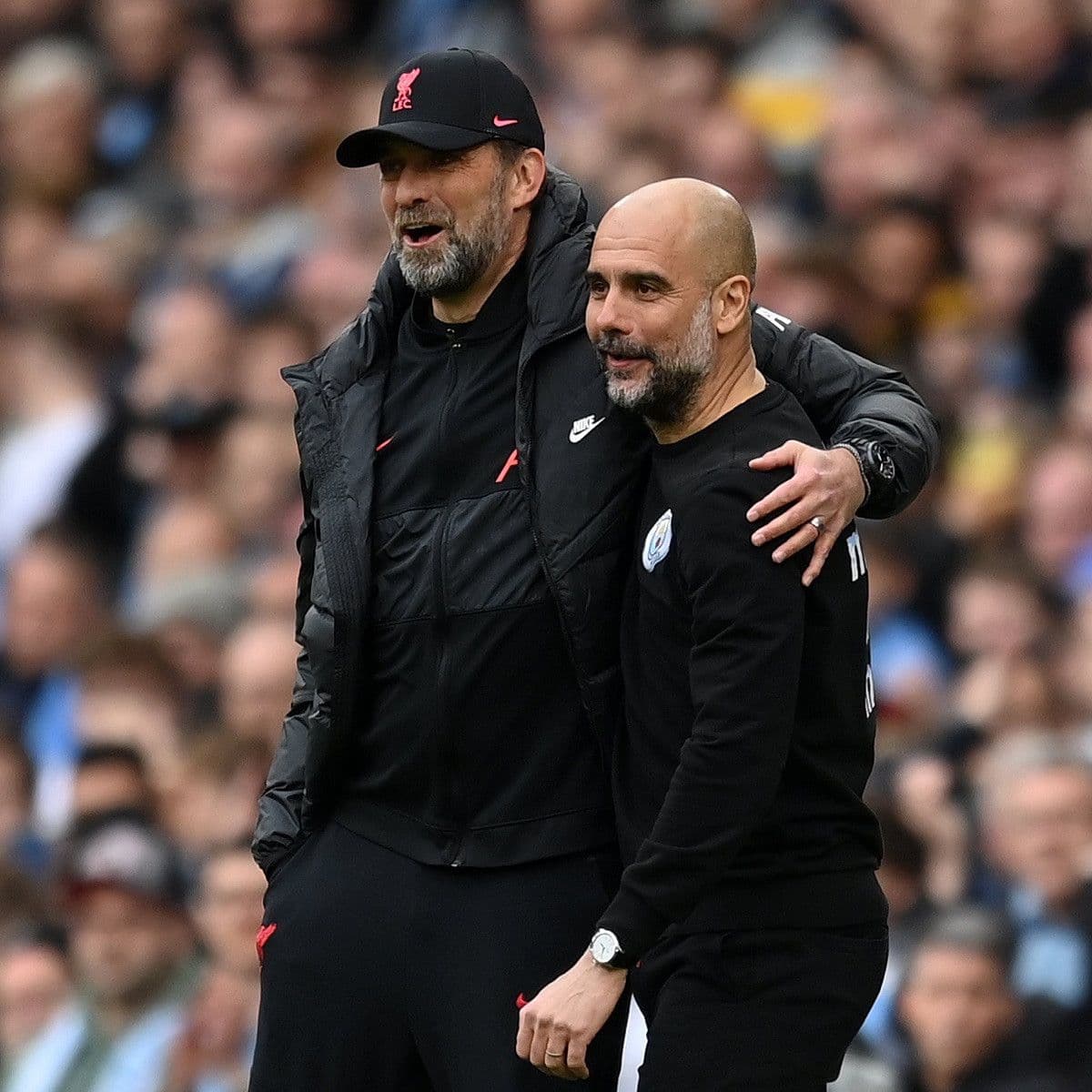 Hai huấn luyện viên Pep Guardiola và Jurgen Klopp, biểu tượng của cuộc đua Ngoại hạng Anh