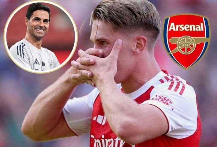 HLV Mikel Arteta và cầu thủ Arsenal thể hiện sự quyết tâm trên sân cỏ.
