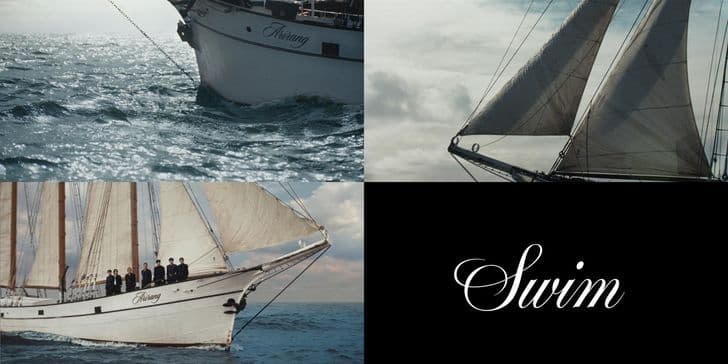 Hình ảnh teaser cho ca khúc 'Swim' của BTS, với con thuyền 'Arirang' trên biển và tên bài hát 'Swim'.