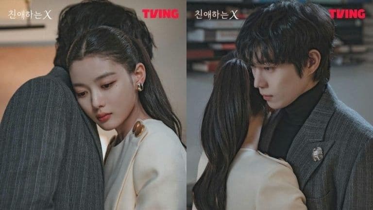 Kim Yoo Jung tựa vào bạn diễn nam với vẻ mặt buồn bã, thể hiện trải nghiệm cảm xúc sâu sắc và giằng xé nội tâm trong 'Dear X'