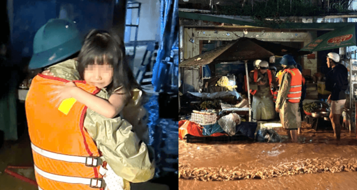 Lực lượng cứu hộ giúp đỡ người dân sơ tán khỏi vùng ngập lụt do mưa lớn từ áp thấp nhiệt đới.