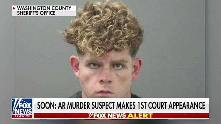 Màn hình tin tức hiển thị ảnh nghi phạm Andrew James McGann, một giáo viên, nhấn mạnh tính chất vô cớ của tội ác.