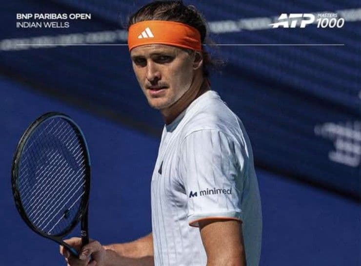 Một tay vợt nam đang thi đấu tại giải Indian Wells, thể hiện tinh thần thể thao chuyên nghiệp.