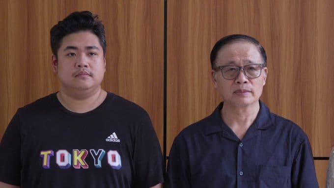 Ông Vũ Minh Châu và con trai Vũ Minh Tú tại cơ quan điều tra, liên quan vụ án Bảo Tín Minh Châu.