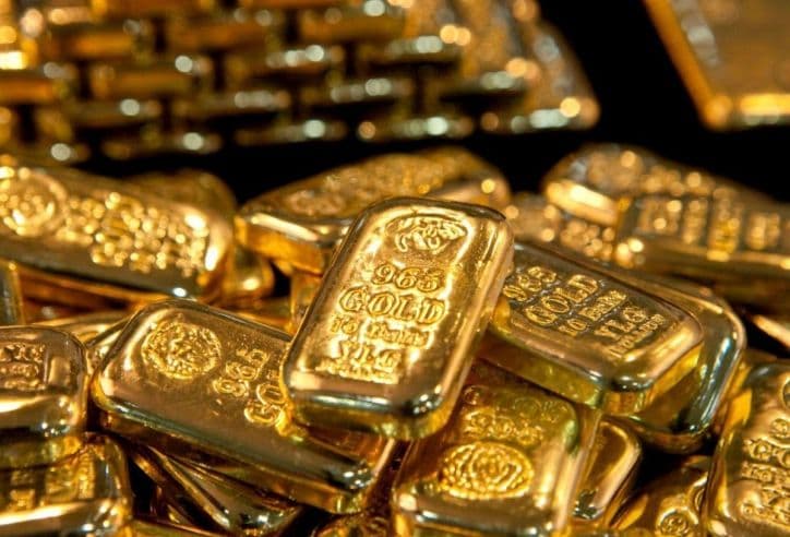 Những thỏi vàng tượng trưng cho nguồn tài chính lớn từ XSMN, đóng góp vào ngân sách nhà nước và các công trình phúc lợi xã hội.