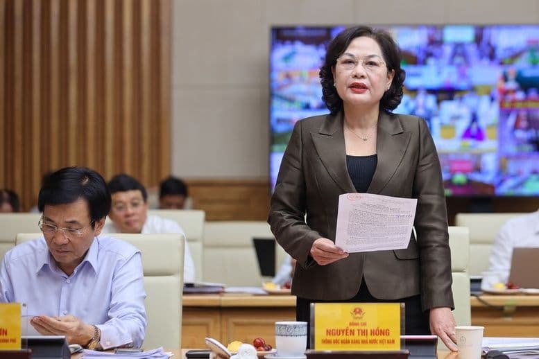 Thống đốc Ngân hàng Nhà nước Nguyễn Thị Hồng phát biểu tại cuộc họp, hình ảnh người thuyền trưởng vững vàng của nền kinh tế.