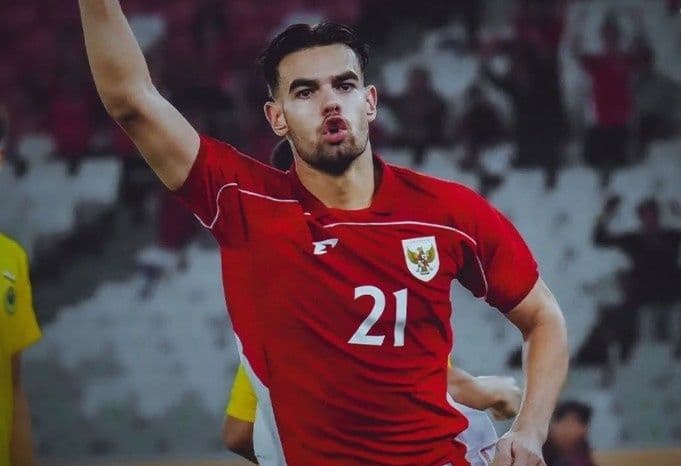 Tiền đạo Jens Raven của U23 Indonesia ăn mừng sau khi ghi bàn quan trọng.