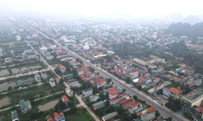 Tuyến đường nối huyện Hoa Lư và TP Ninh Bình - Thành phố Hoa Lư sau mở rộng. Ảnh: Lê Hoàng