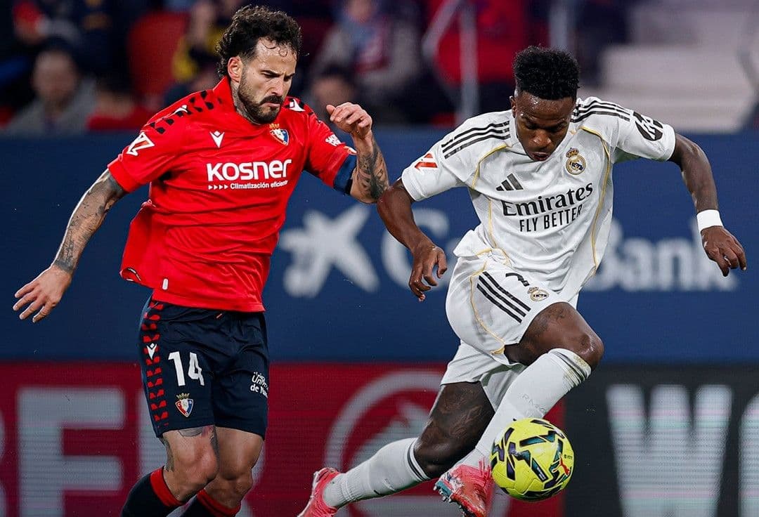 Vinicius Jr. của Real Madrid cố gắng đột phá hàng phòng ngự đối phương, tìm chìa khóa vượt qua 'khiên chắn thép' của Getafe.