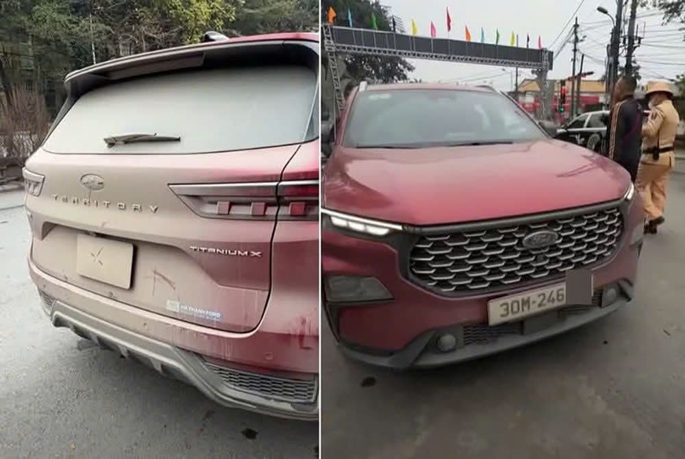 Xe Ford Territory bị bùn che biển số đang được cảnh sát giao thông kiểm tra